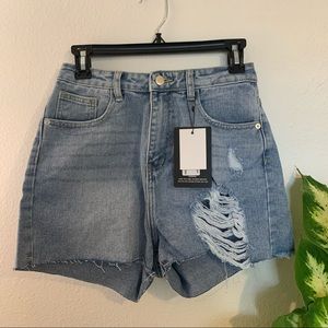 Prettylittlething distressed mom shorts